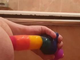 Sasha earth fucks her ass with a sex toy at home on the bed