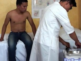 Young Asian boy gets a blowjob from a doctor in uniform