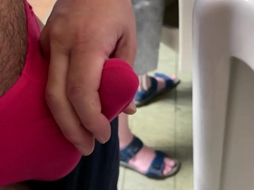 A guy give me a handjob and i make a huge load in public toilet